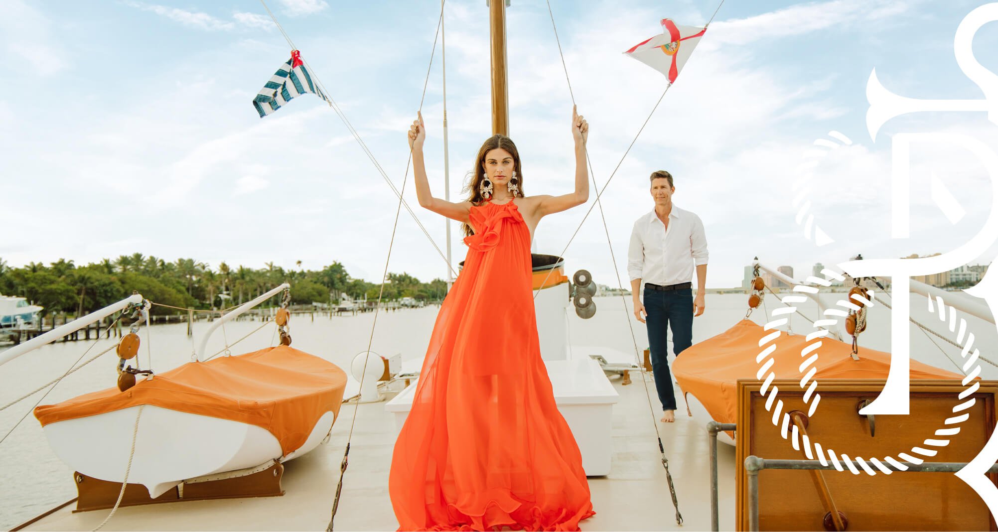 Jacober Creative Brand Identity for The Town of Palm Beach Marina. Models on top of the boat and flags.