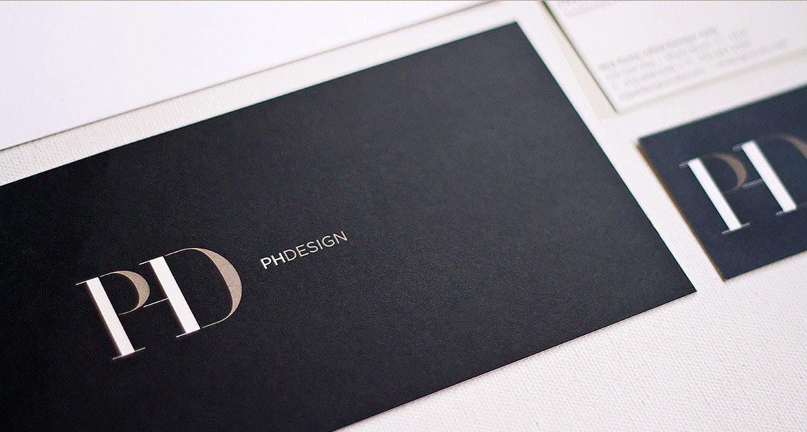 PH Design logo on business card